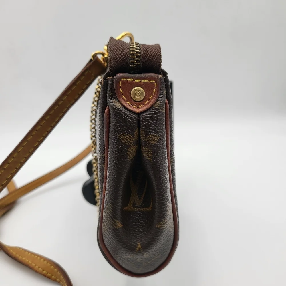 LOUIS VUITTON Eva Monogram Leather Pochette Bag..Authentic..